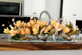 Cache-pot en verre plat 90 cm avec magnolias pêche