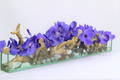 Cache-pot en verre plat 120 cm avec orchidées violettes