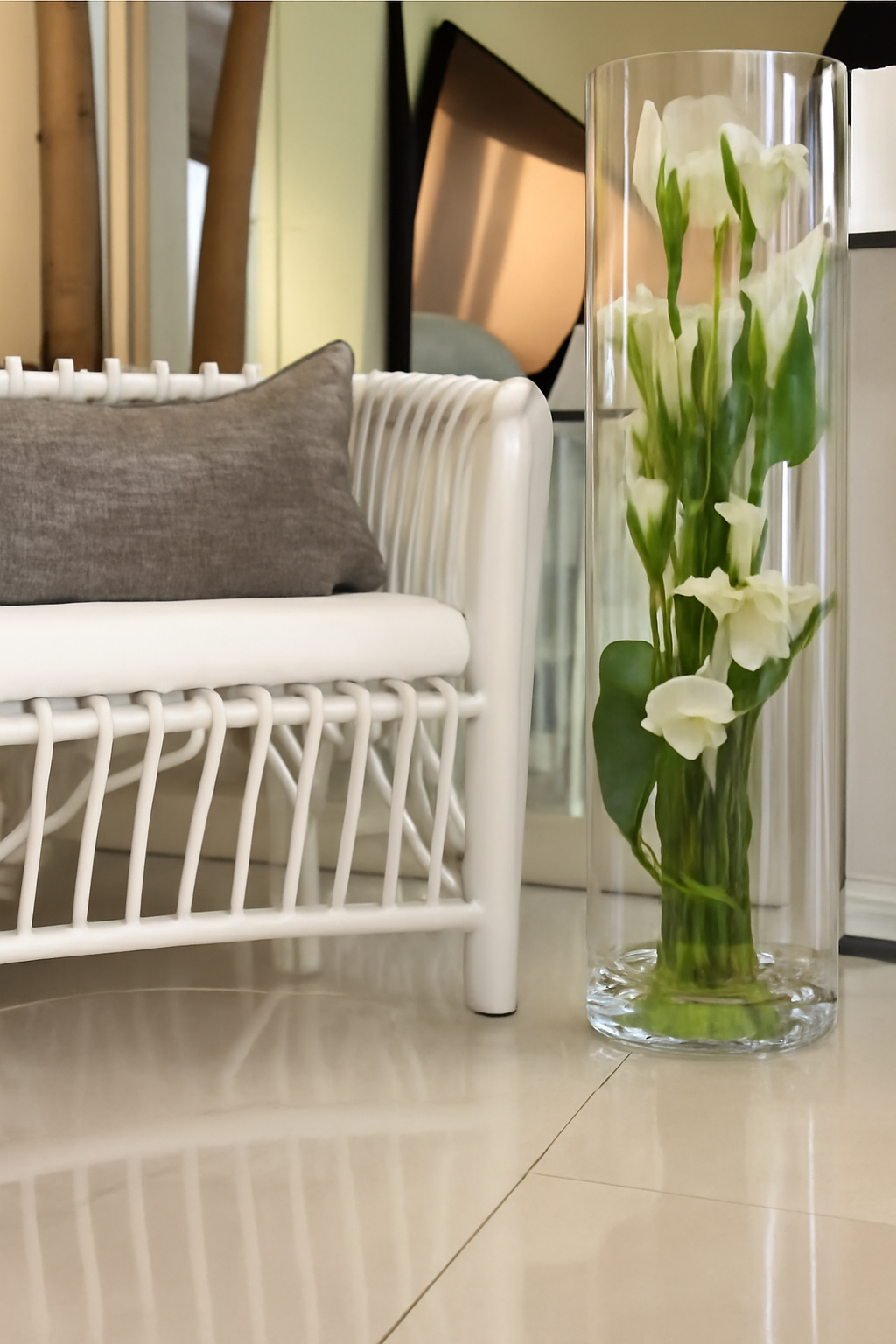 Cylindre avec callas blancs et feuillage