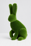 Lapin décoratif assis